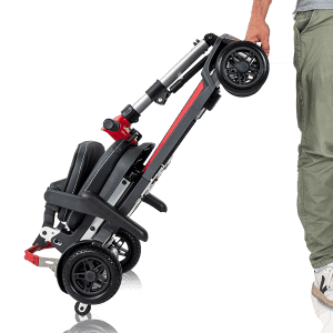 Scooter eléctrico plegable Formentera con ruedas de transporte, se arrastra como una maleta